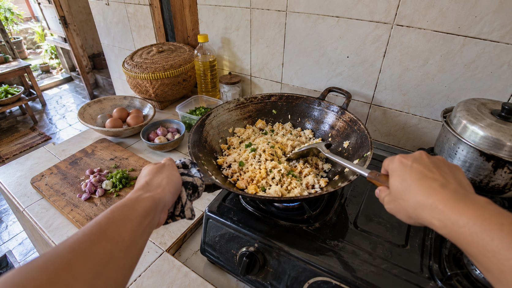 Illustrative first-person view of cooking fried rice in an Indonesian kitchen